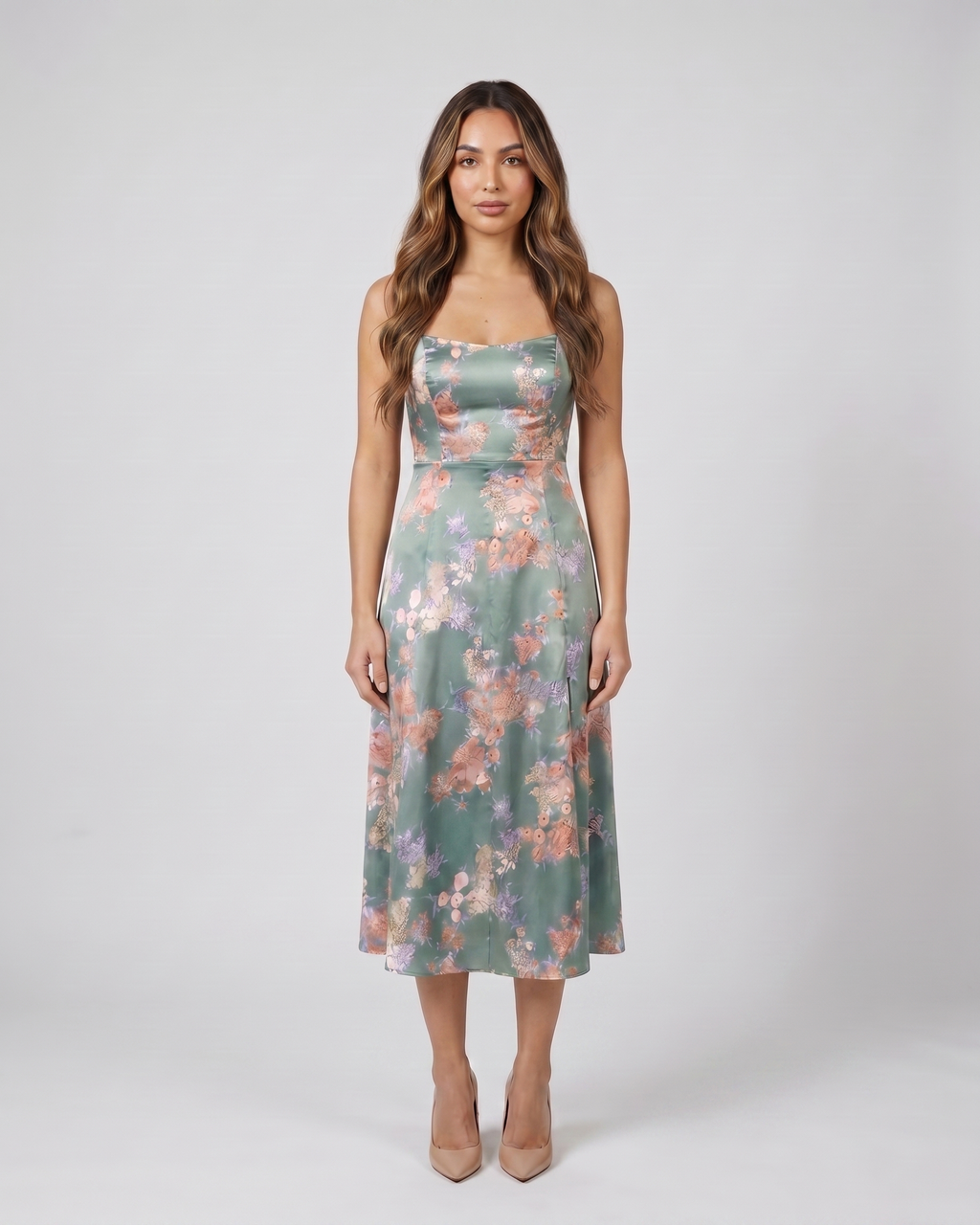 Back view of green wedding guest floral tie front midi dress showing solid back with concealed zipper closure