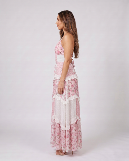Side view of pink wedding guest floral v neck maxi dress