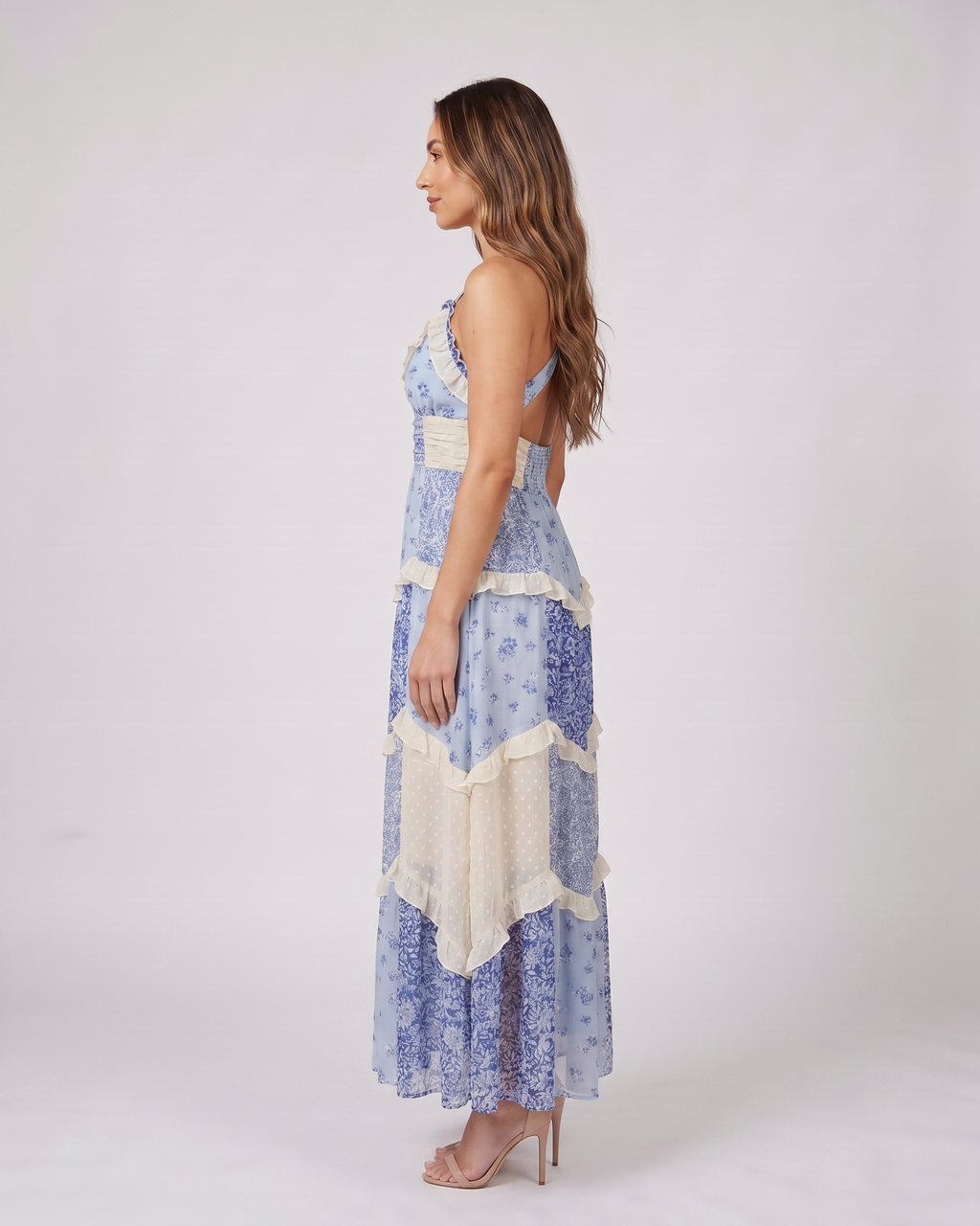 Side view of blue wedding guest floral v neck maxi dress