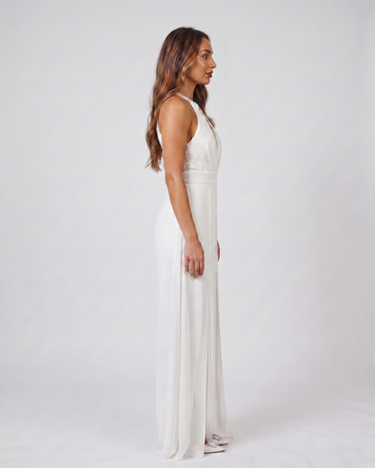 Side view of white wedding guest halter v neck wide leg jumpsuit