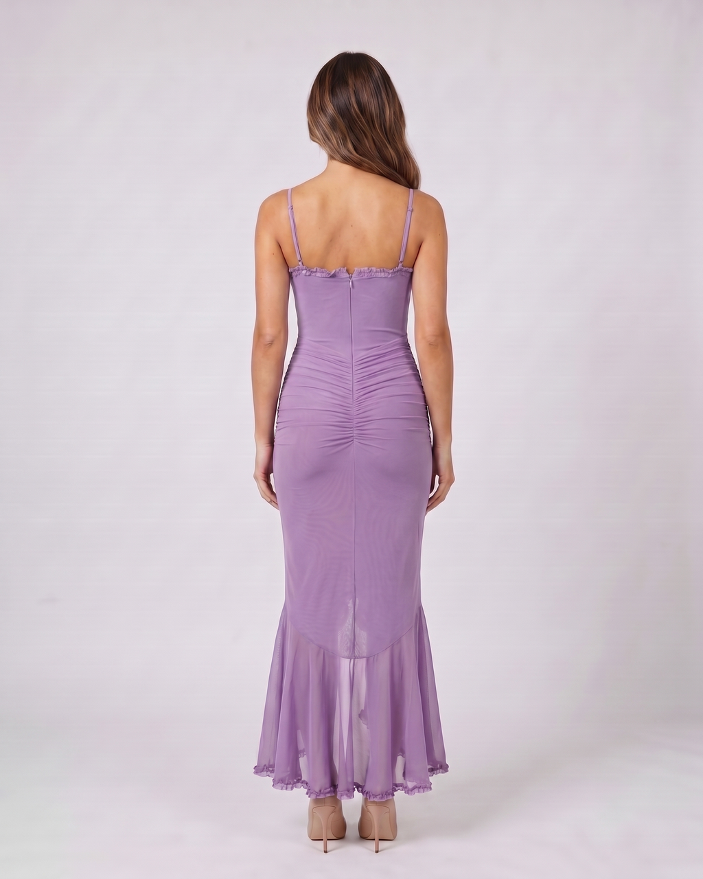 Back view of purple wedding guest ruched sweetheart maxi dress showing solid back with center zipper closure