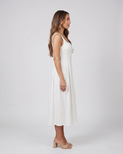 Side view of white wedding guest square neck midi dress