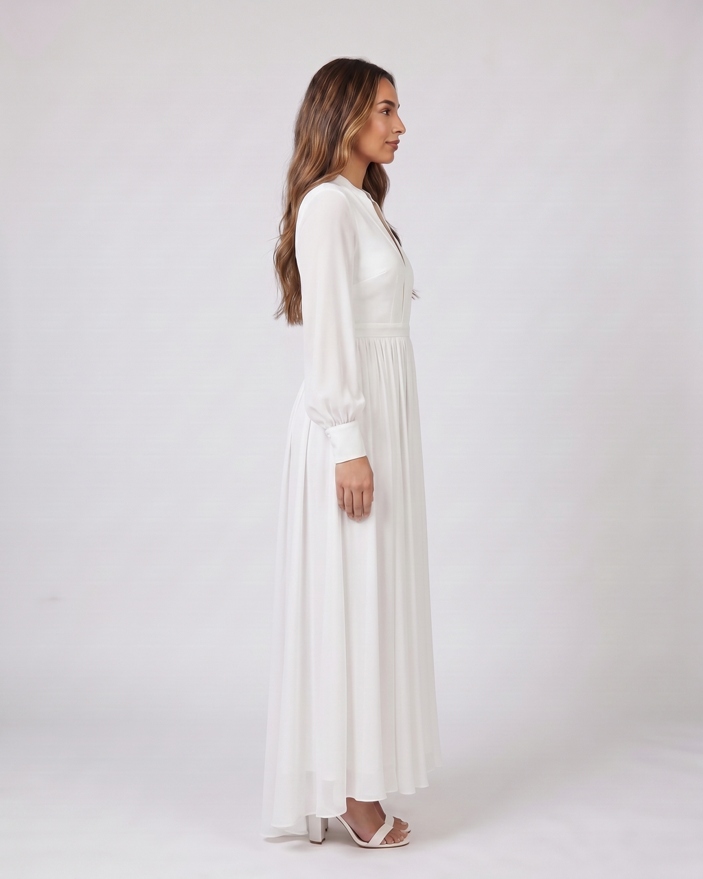Side view of white wedding guest v neck long sleeve maxi dress