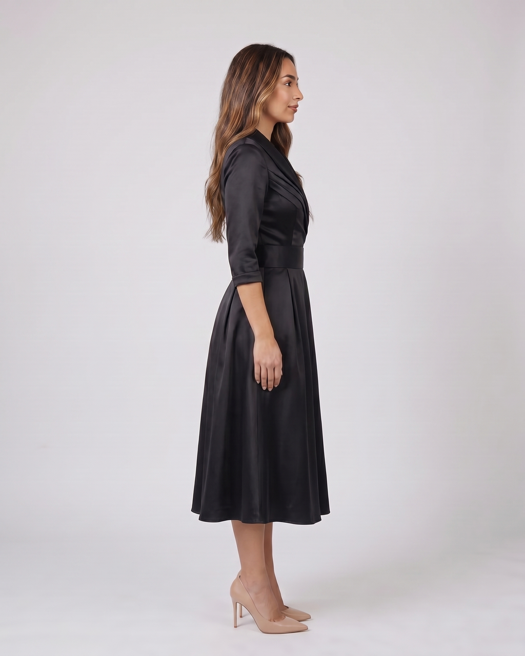 Side view of black wrap v neck 3/4 sleeve with pockets midi dress