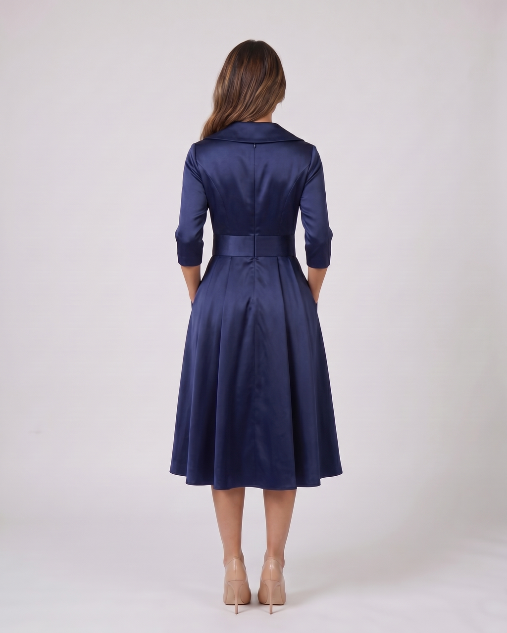 Back view of navy wrap v neck 3/4 sleeve with pockets midi dress showing solid back with center seam, concealed zipper closure