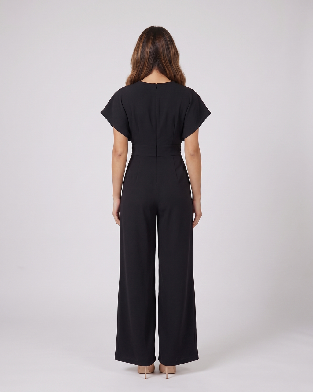 Back view of black cocktail v neck flutter sleeve wide leg jumpsuit showing solid back with round neckline and center back zipper closure