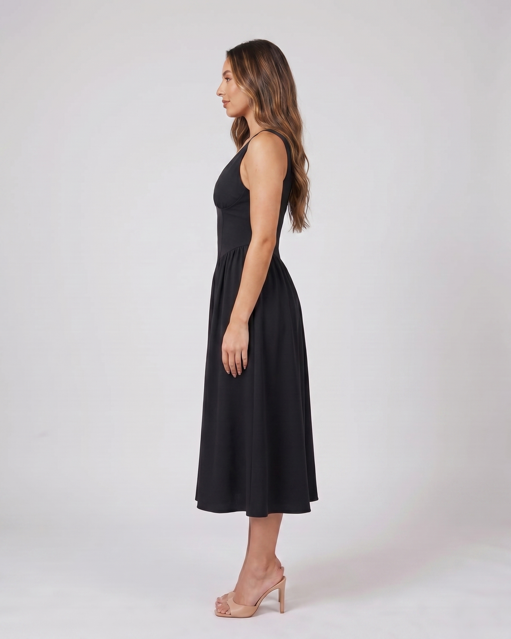Side view of yellow flowers women's wedding guest deep v neck midi a line dress