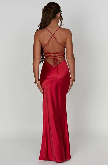 Back view of red satin maxi dress with lace-up straps and open back