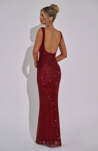 Back view of burgundy sequin maxi dress with open back