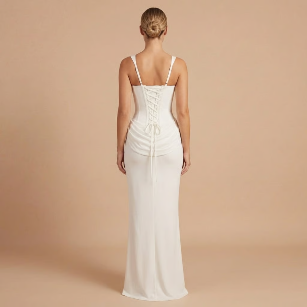White ruched mini dress back view with lace-up corset closure