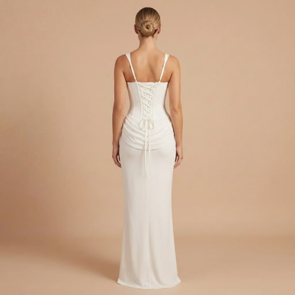 White ruched mini dress back view with lace-up corset closure