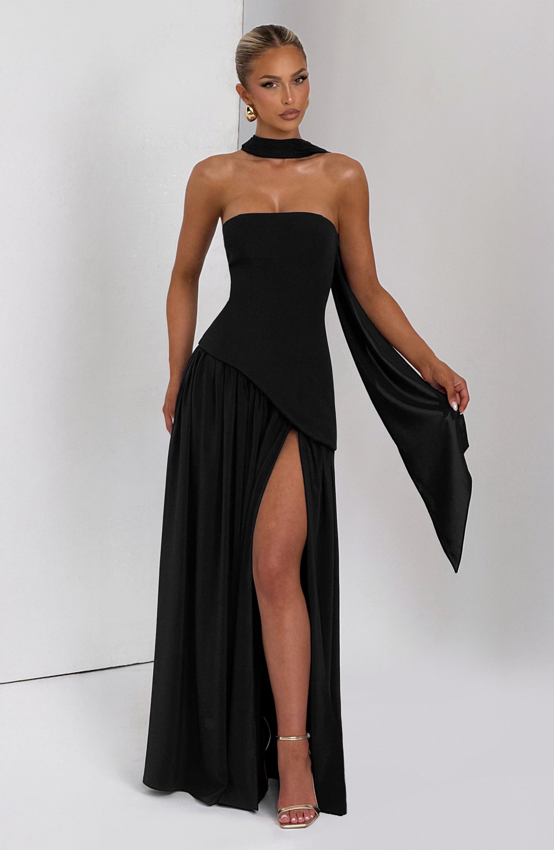 Black strapless maxi dress with choker neckline and asymmetric high slit front