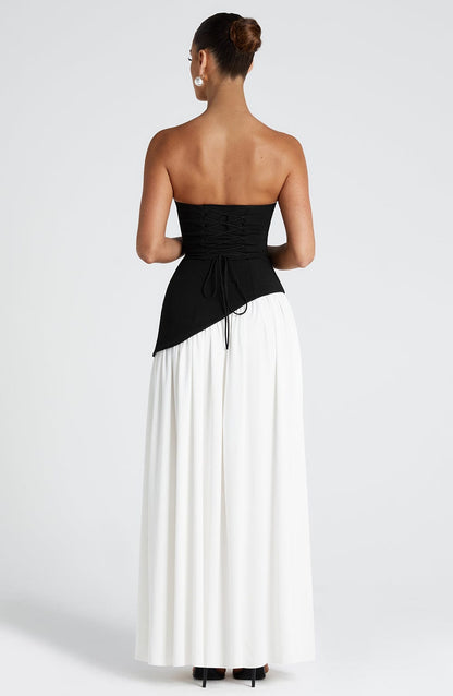 Black and cream color-block strapless maxi dress with asymmetric waist back view