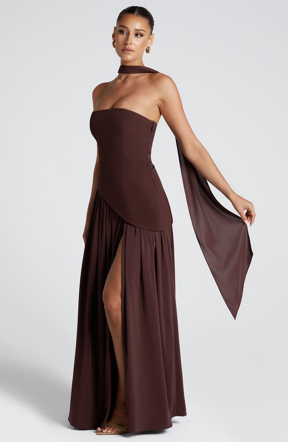 Brown strapless asymmetric maxi dress with choker collar and high slit front view