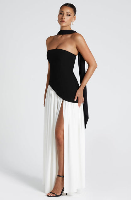 Black and white colorblock strapless maxi dress with asymmetric waist drape