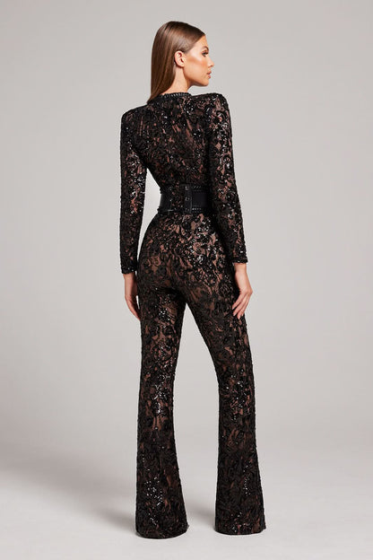 Back view of black sequin lace wide leg jumpsuit with long sleeves
