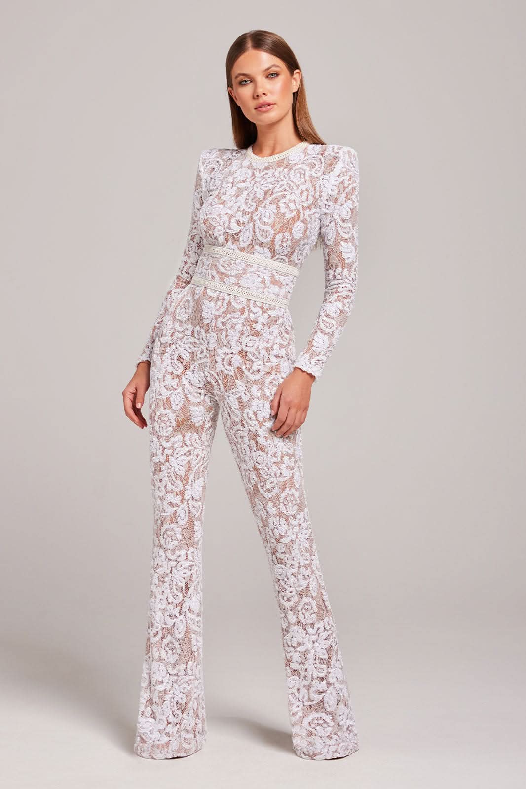 White lace long sleeve jumpsuit with wide leg and cream waist belt