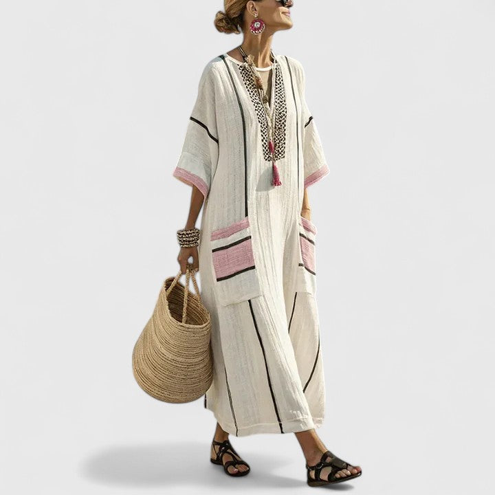 Women cream maxi caftan dress with pink and dark striped trim and embroidered center panel