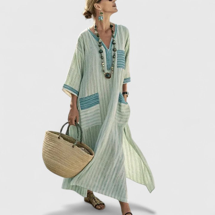 Women teal and cream striped maxi dress with V-neckline and boho trim detailing