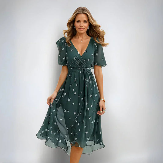 Women's teal floral midi dress with V-neckline wrap bodice and short flutter sleeves