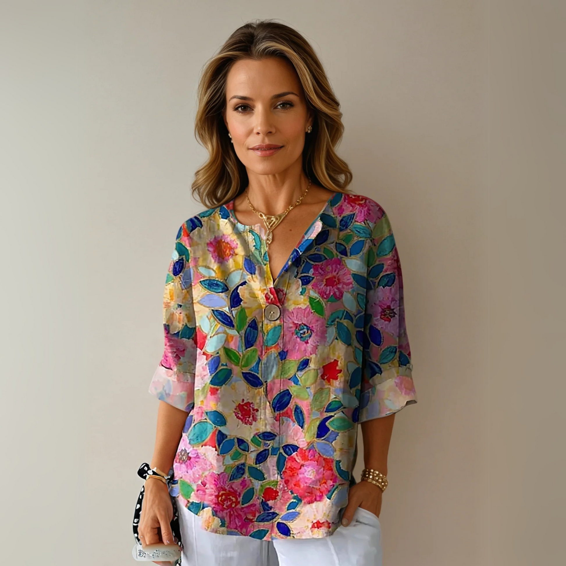 Women's multicolor floral blouse with split V-neckline and button closure