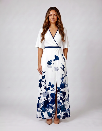 White wedding guest V-neck maxi dress with navy blue floral print and trim binding front view